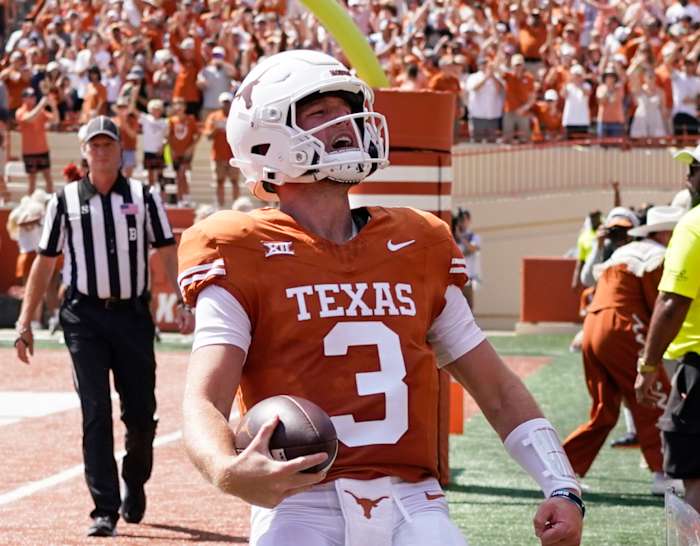 Quinn Ewers celebrates a Texas Longhorns touchdown vs. Kansas